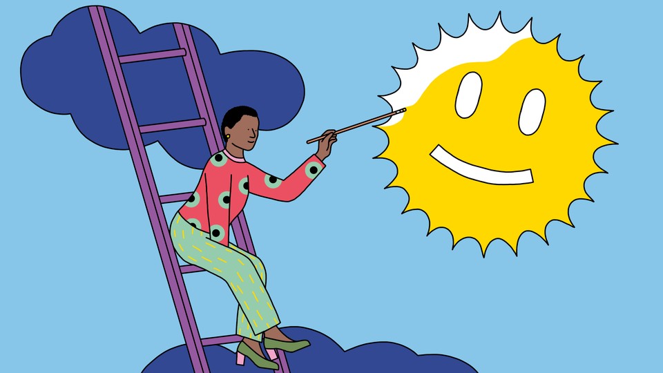 A woman paints a smiley face onto the sun
