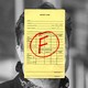 A photo illustration of Elon Musk's face being covered by a report card with a big red "F" on it.