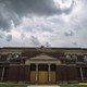 An abandoned, boarded up building in Chicago that two years before this photo was taken housed a school that was later closed