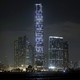 A photo of the art installation "Countdown Machine." A countdown to the year 2047 is projected onto the facade of Hong Kong's tallest skyscraper.