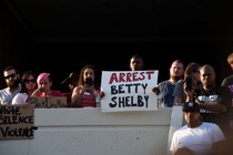 Protesters call for the arrest of Betty Shelby, the officer who fatally shot Terence Crutcher, outside police headquarters in Tulsa, Oklahoma. 