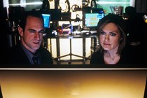 Law and Order: SVU detectives Benson and Stabler stare at a computer screen