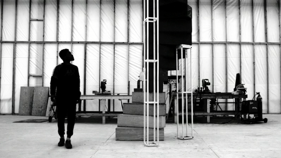 Frank Ocean looks up at his spiral staircase