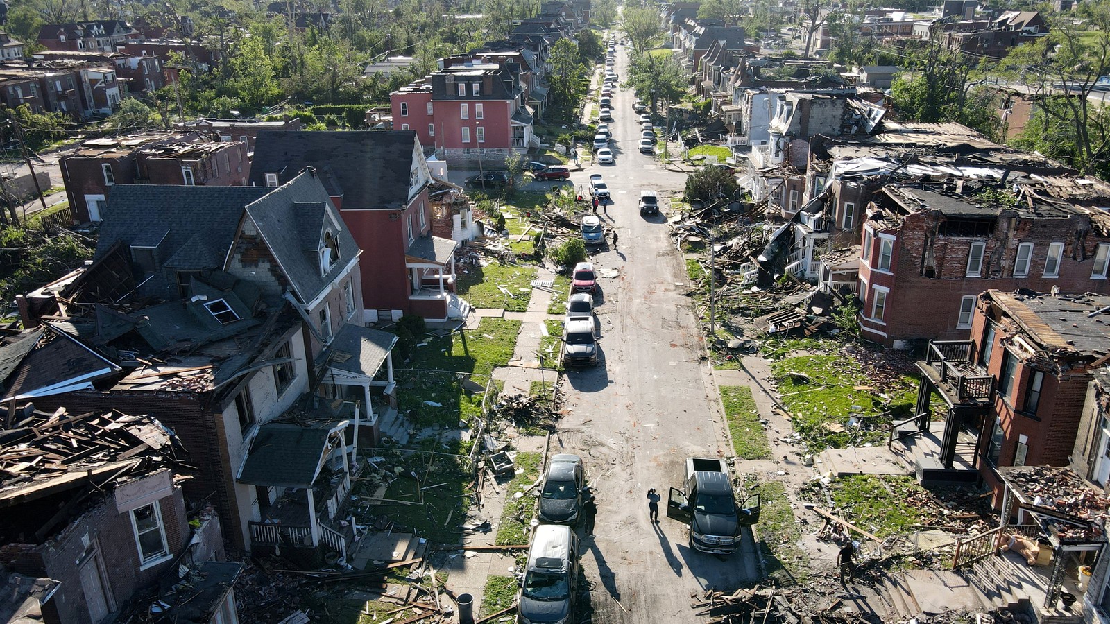 A drone view shows damaged houses after a tornado struck St. Louis.