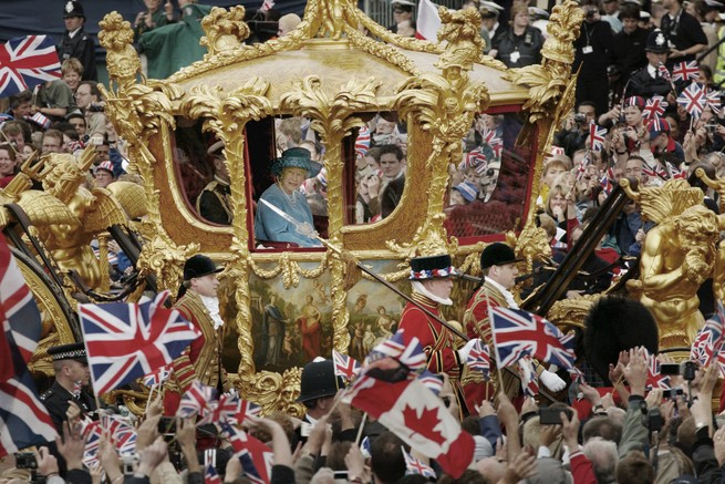 Queen in a gilded coach surrounded by revelers