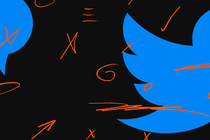 The twitter logo on a black background with red scribbles