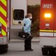 Ambulances in front of the Life Care Center of Kirkland.