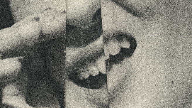 Photo of a distorted woman's mouth.