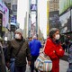 People wearing masks in Times Square