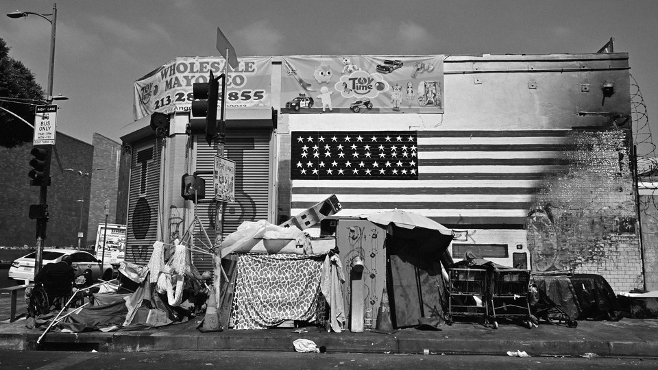 An encampment outside a closed store