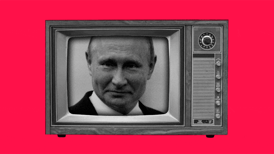 A television, which is broadcasting Russian President Vladimir Putin's face, being turned off