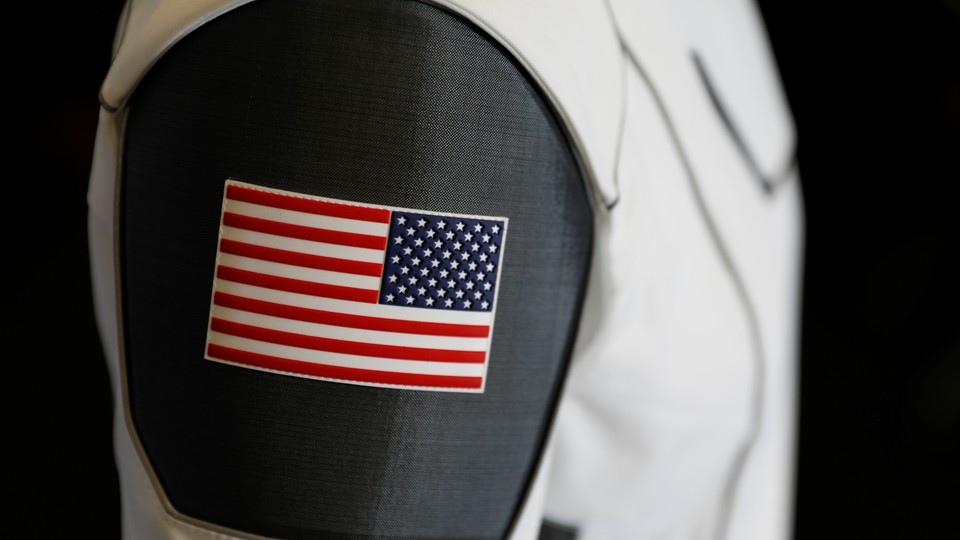 An American flag patch on the arm of SpaceX's space suit for astronauts