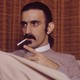 Frank Zappa smoking a cigarette