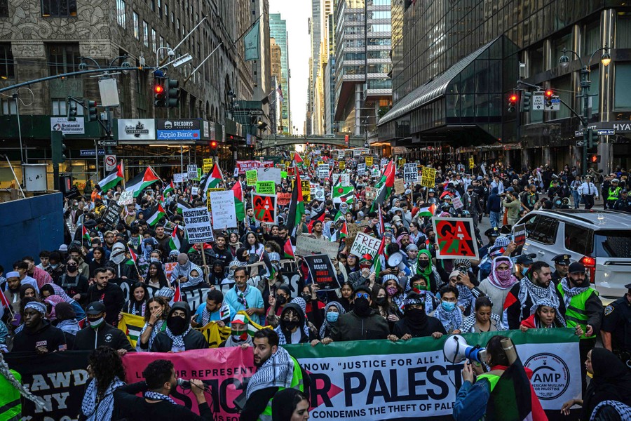 A large crowd of pro-Palestinian protesters marches through New York City.