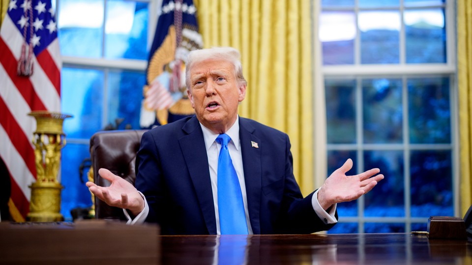 Donald Trump speaks during an executive order signing in the Oval Office