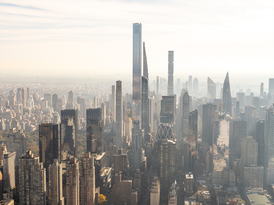 photo of Midtown Manhattan skyline with supertall buildings and shorter skyscrapers, with Central Park visible on left