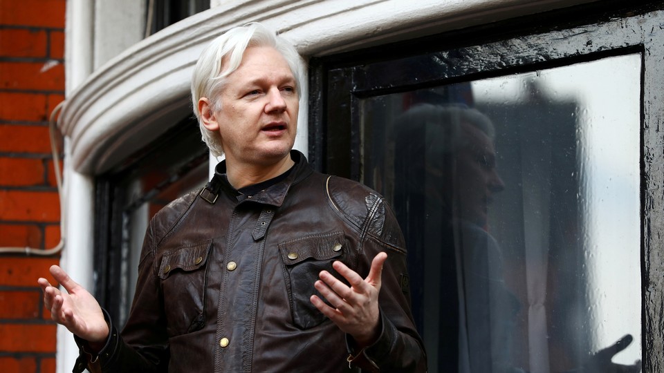 Julian Assange is seen on the balcony of the Ecuadorian Embassy in London on May 19, 2017.