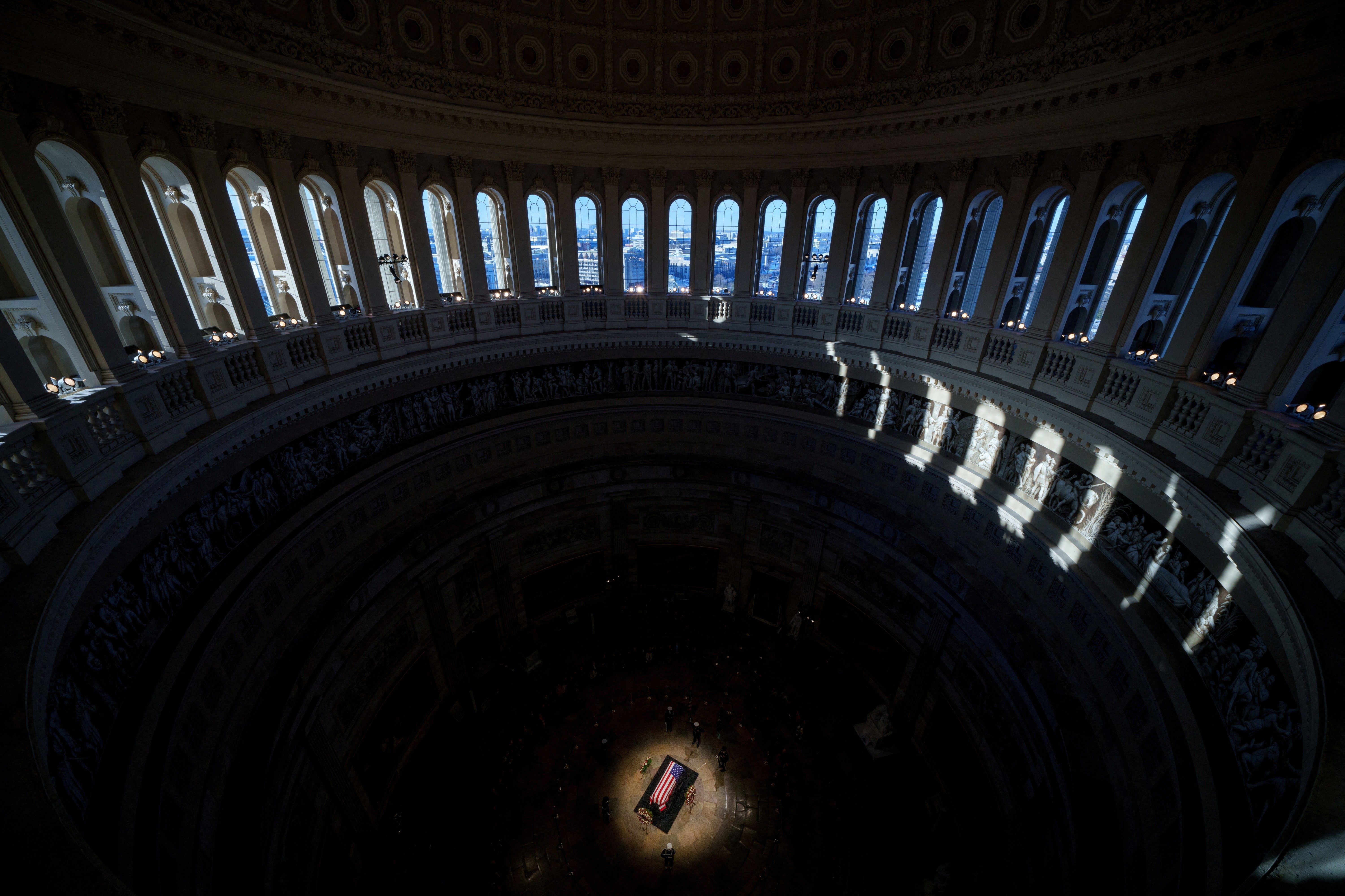 An elevated view of the flag-draped casket of former U.S. President Jimmy Carter, lying in state in the U.S. Capitol Rotunda