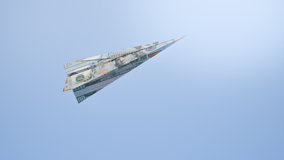 Bills are folded into a paper airplane, which is flying in the air