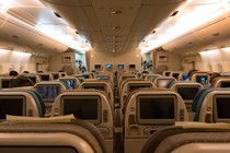 Photo of the inside of a passenger airplane cabin