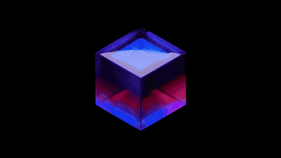 animated GIF of a translucent, gem-like cube rotating slowly against a pure black background. it transforms into a wave of small orbs.