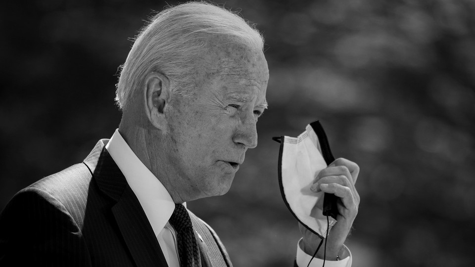 Biden taking his mask off