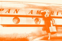 A woman poses next to a Pan America plane