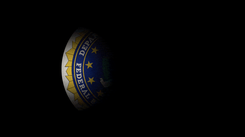 Animination of a spotlight briefly illuminating parts of an FBI seal in the shadows