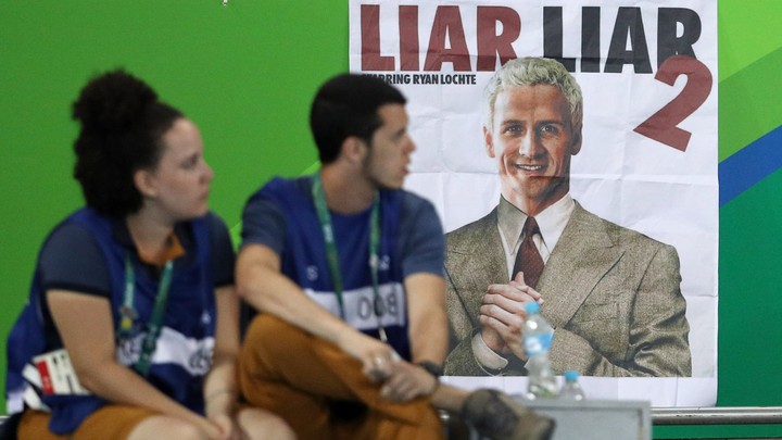 A sign lampooning Ryan Lochte