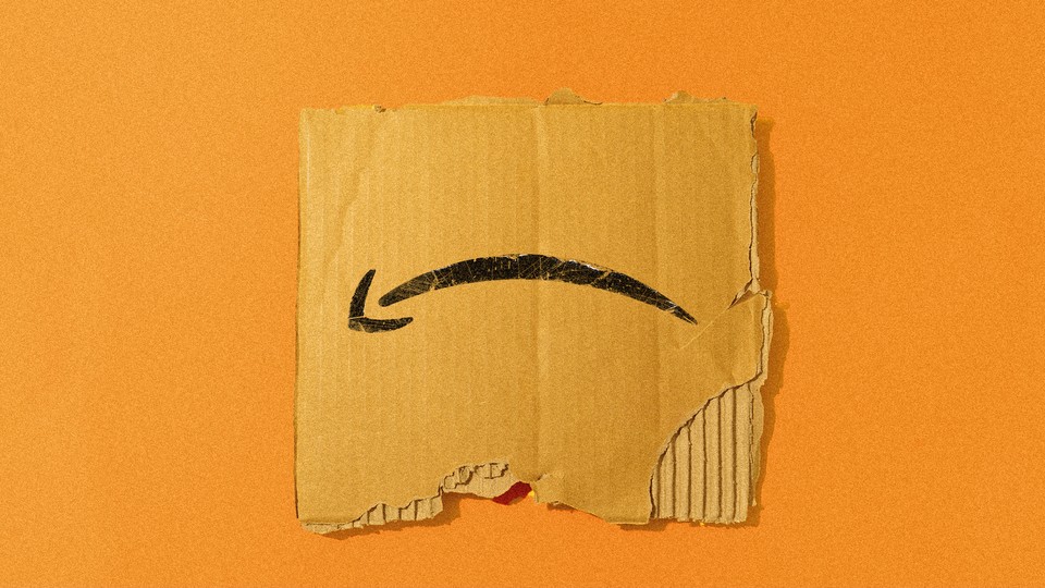 A torn piece of an Amazon box, the logo upside down, rests against an orange background.