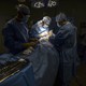 Surgeons work on a patient at Dr. Isaac Gonzalez Martínez Oncological Hospital in San Juan.