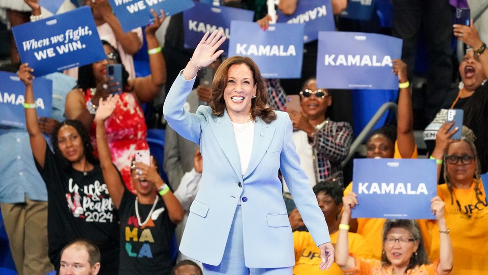 Kamala Harris greeting crowds at a rally