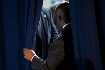 Secret service agents confer during a rally for Vice President Joe Biden at West York Area High School in York, Pennsylvania on September 2, 2012.