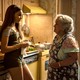 Nina and Abuela Claudia from 'In the Heights' in an apartment kitchen