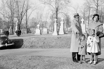 John A. Madison, great-grandson of Dred Scott, points to his ancestor's unmarked grave.