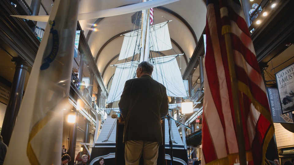 A reader takes the helm at the Moby-Dick Marathon reading, held at the New Bedford Whaling Museum.