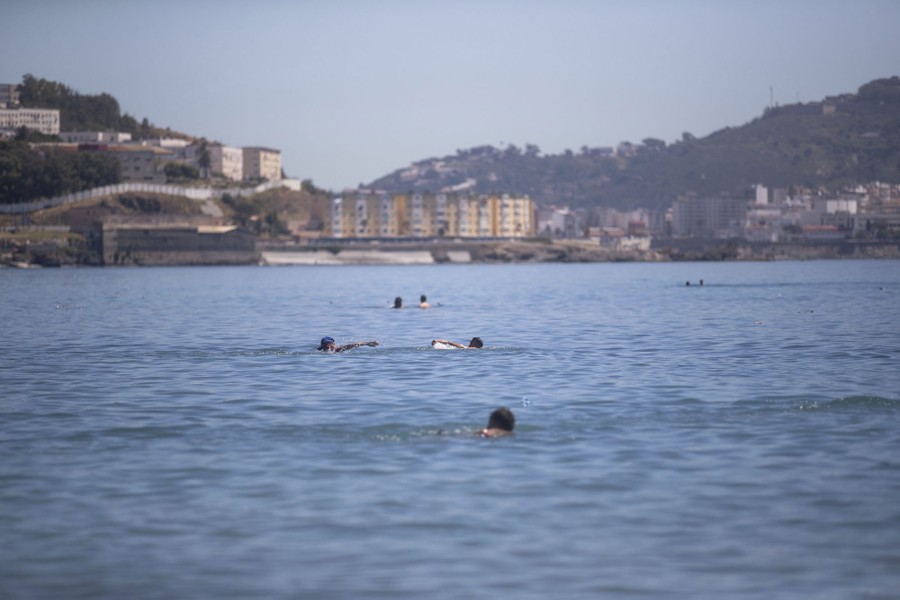 Young men swim from Morocco to nearby Spanish territory.
