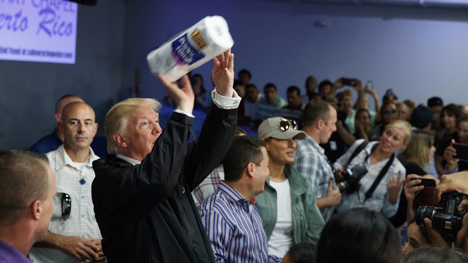 President Trump visits an aid-distribution center in Puerto Rico on October 3, 2017.