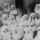 A historical photograph of Red Cross nurses