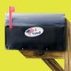 A mailbox with an "I Voted" sticker