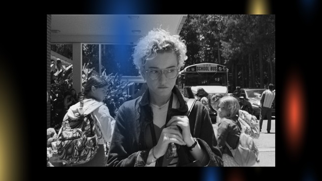 Julia Garner walking outside a school in Weapons