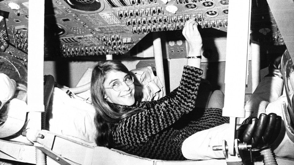 Margaret Hamilton, the lead software designer for the Apollo 11 mission, sits in a mock-up of the Apollo 12 command module.