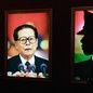 An image of Jiang Zemin and a silhouette of a PLA soldier