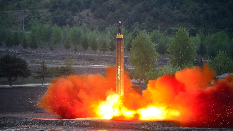 The long-range strategic ballistic rocket Hwasong-12 (Mars-12) is launched during a test. 