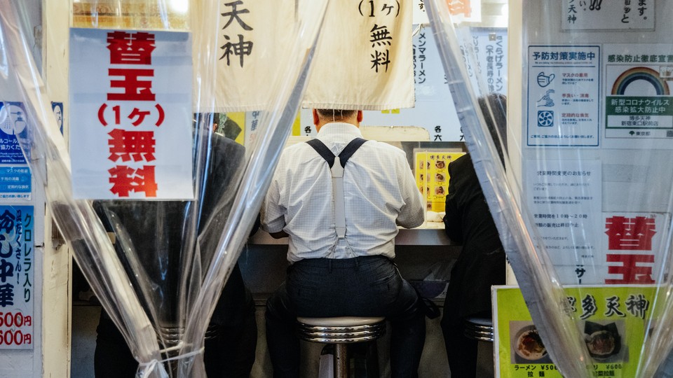 An image of a man in a ramen shop in Japan