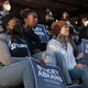 A photo of young people holding signs supporting Stacey Abrams