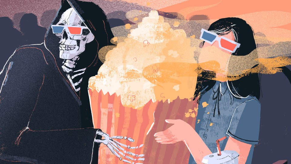 A moviegoer shares popcorn with a grim reaper.