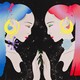 illustration of two women facing each other in front of a cosmic background