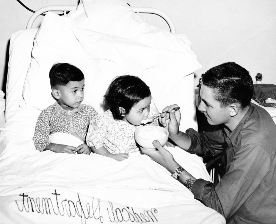 Edward, Chris and Helen at Aiea Heights Naval Hospital in Hawaii in October 1945, shortly after they were reunited.