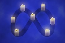 Meta logo with candles on it
